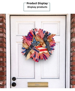 Detail of Fourth of July wreath with patriotic stars and stripes on a white door