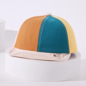 Detail of multi-color block soft brim baby baseball cap with cotton canvas stitching
