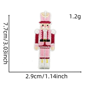 Detail showing dimensions of pink Nutcracker embroidered patch, 7.7cm x 2.9cm and 1.2g