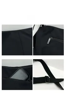 Detail view of black nylon dumpling bag featuring stitching and adjustable strap buckle