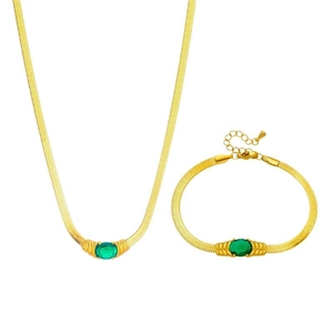 Gold snake bone chain jewelry set with green oval gemstones on necklace and bracelet