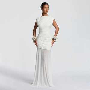 Elegant sleeveless white dress with ruched details and asymmetrical semi-sheer skirt