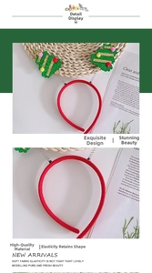 Detail showing elastic red fabric headband with green glitter Christmas tree and colorful pompoms