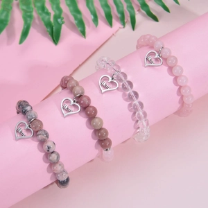 Bracelets en pierre zébrée rose avec pendentifs cœur gravés Mom pour maman