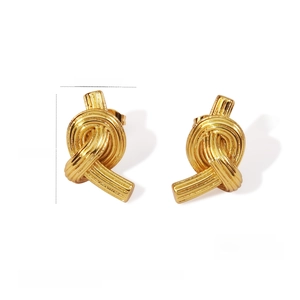 Macro detail of 18K gold plated stainless steel knot earrings with size dimensions