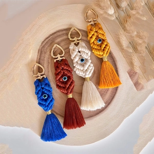 Bohemian handmade tassel keychains with evil eye bead in four vibrant colors