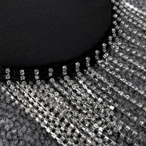 Elegant black high-waisted skirt suit with sparkly silver rhinestone fringe trim for women