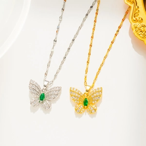 Minimalist 18K rose gold butterfly necklace with green gemstone and sparkling crystals