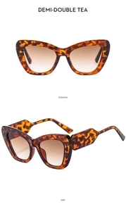 Detail of tortoise shell cat eye sunglasses with gradient tea lenses and side view