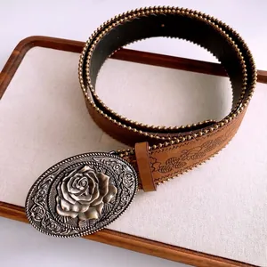 Vintage brown leather belt with embossed leaves and large oval rose engraved buckle