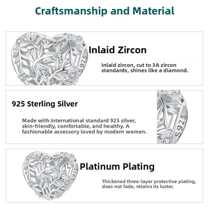 Detailed view of S925 sterling silver heart charm with leaf patterns and 3A cubic zirconia