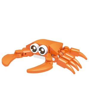 Detail of orange building block crab toy with vivid eyes on a clean white background