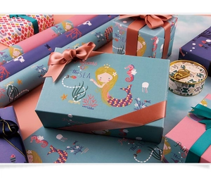 Détail du lot de papier cadeau Sirène en bleu Tiffany et rose fleur de cerisier