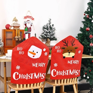 Christmas snowman and reindeer dining chair covers with HoHo lettering for holiday decor