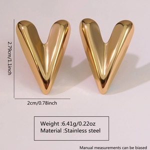 Macro shot of V-shaped gold stainless steel earrings with precise measurement details