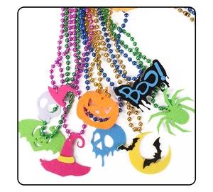 Close-up of Halloween beaded necklace with colorful felt pumpkin and ghost pendants