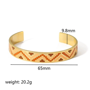 Enameled geometric stainless steel open bangle with wave pattern dimensions and specs
