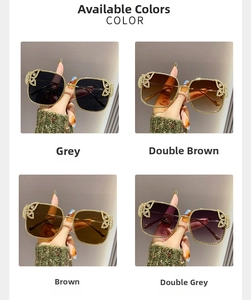 Detailed view of oversized metal sunglasses featuring diamond-encrusted butterfly hinges