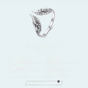 Detail of 925 sterling silver wing ring showing feather texture and S925 engraving