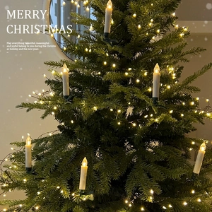 Ivory Christmas candle LED string lights with warm yellow glow on holiday tree branch