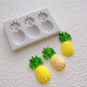 Pineapple silicone fondant mold for cake decorating with three yellow fruit shapes