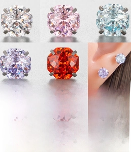 Detailed macro view of 6mm zircon stud earring featuring a four-prong setting in silver steel