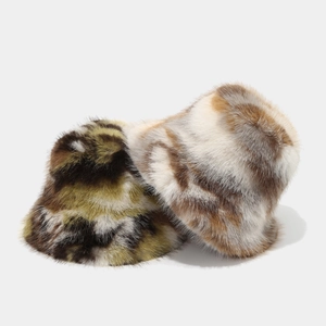 Faux fur bucket hat with camouflage and animal print pattern for winter warmth