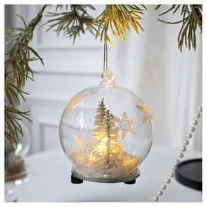 Hanging glass Christmas ornament with micro landscape, LED lights, and miniature pine tree