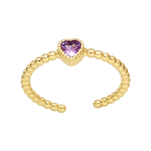 Detail of a purple heart gemstone ring with a golden beaded texture open band design