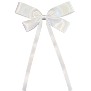 Close-up of white satin bow hair clip with long ribbons and a smooth silk texture