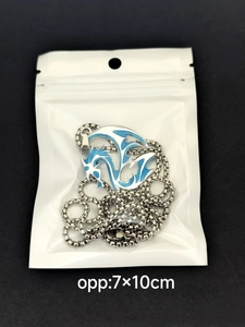 Luminous dragon pendant necklace in silver tone, shown inside a clear 7x10cm OPP bag