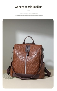 Detailed view of brown woven PU leather backpack with vertical zip pocket and top handle