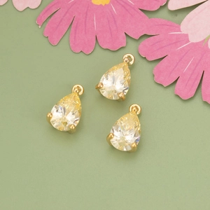 Champagne teardrop cubic zirconia pendant set with gold-plated base for jewelry making
