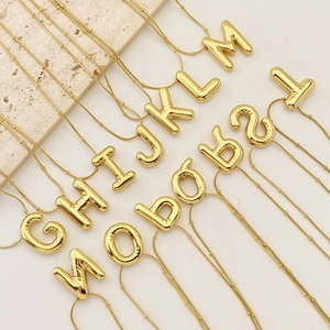 Polished 3D balloon alphabet necklace in gold stainless steel with bead chain