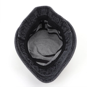 Detailed interior of vintage washed denim bucket hat showing sweatband and stitching