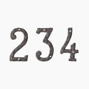 Vintage cast iron house numbers 2 3 4 with rustic texture and mounting holes