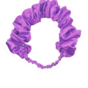 Macro shot of purple satin pleated elastic headband with smooth silk texture