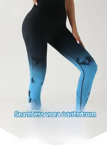 Close-up of seamless high-waist yoga leggings featuring blue tie-dye gradient and crackle print