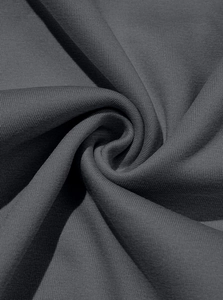 Macro detail of dark grey knit fabric texture showing premium soft fleece material