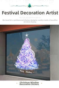 Detail of blue purple glowing Christmas tree window decal with Merry Christmas text
