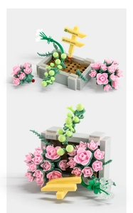 Detail of buildable succulent blocks with pink flower buds and a grey rectangular flowerpot