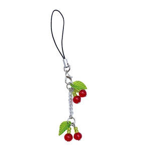 Handmade cherry glass beaded phone charm with red beads and green leaves on white background