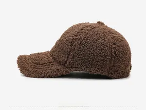 Side view of dark brown teddy fleece baseball cap showing soft lambswool texture and profile