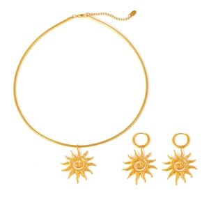 Spiral sun pendant necklace and earrings set in 18k gold plated titanium steel
