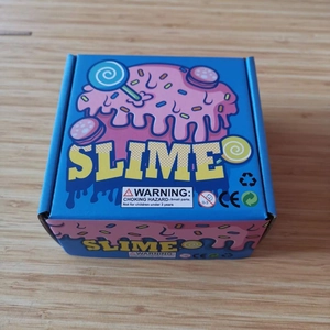 Detail view of colorful 4-pack butter slime kit packaging with doughnut design