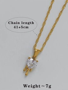 Detail of heart lava pendant necklace in gold finish with chain length specifications