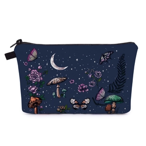 Close-up of sunflower and celestial pattern on dark blue multi-function makeup pouch