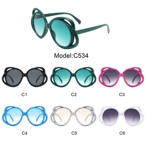 Oval oversized cutout sunglasses for women in six colors including black and green