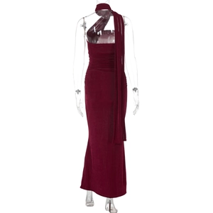 Back view of burgundy strapless backless velvet maxi dress with a matching scarf