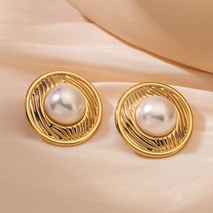 Elegant 18K gold plated heart earrings with pearls on silk background